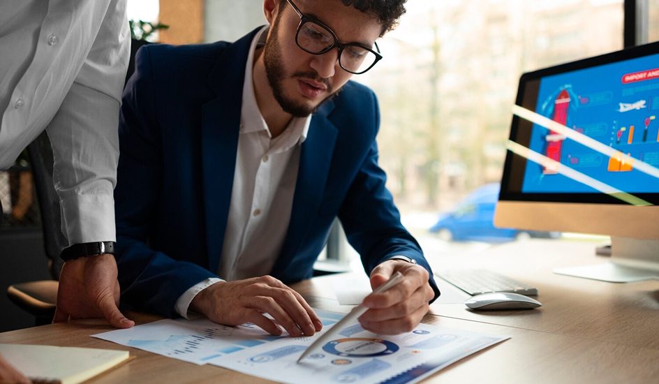 Accountant reviewing financial reports and business performance